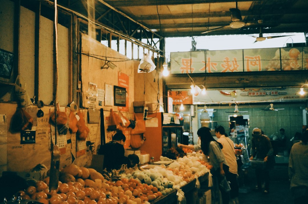 market vendor selling fruits