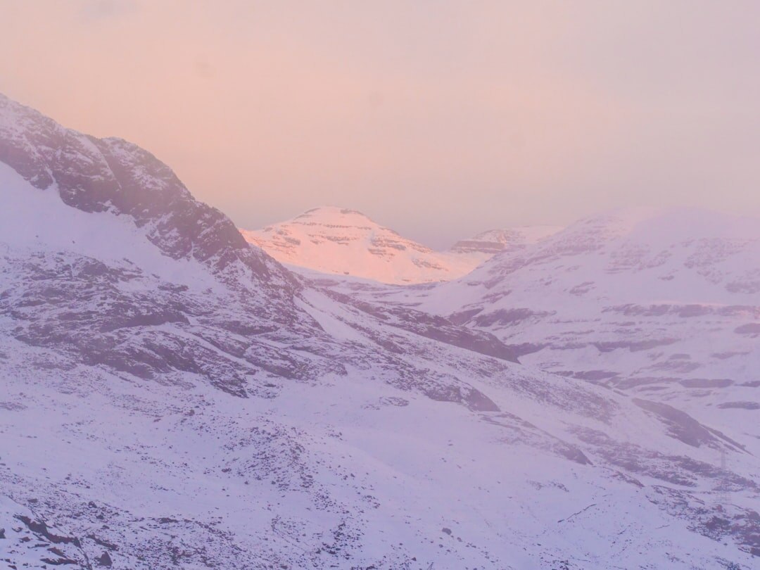 Snow-capped Andes mountains at sunset seen from a Chilean valley